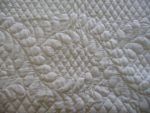 Hand quilting Heirloom Quilt