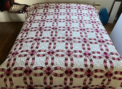 Hand quilted Double Wedding Ring Amish quilt for sale