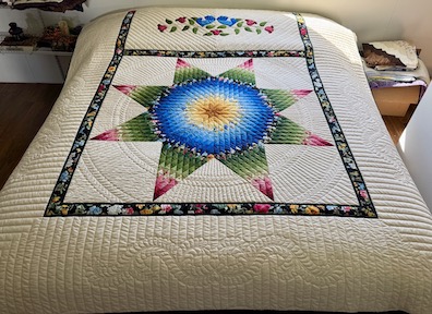 Radiant Star Amish Quilt