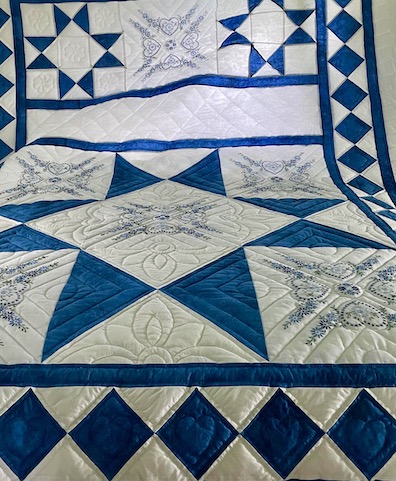 Embroidered Amish quilt pattern